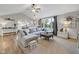 Bright and open living room with large sectional sofa and stylish accents at 5925 Leisure Ln, Pittsboro, IN 46167