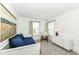 Comfortable bedroom featuring a daybed, modern dresser, and neutral decor at 605 Tuscany Trl, Lapel, IN 46051