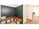 Inviting entryway with a built-in bench, hooks, and storage, offering a functional and stylish space at 605 Tuscany Trl, Lapel, IN 46051