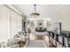 Inviting living room with hardwood floors, fireplace, and comfortable seating, creating a warm and welcoming atmosphere at 6153 Evanston Ave, Indianapolis, IN 46220