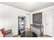 Well-lit office area with desk, storage, and decor providing a functional workspace at 6153 Evanston Ave, Indianapolis, IN 46220