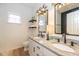 Bathroom with double sinks, granite countertop, modern fixtures, and good lighting at 6328 Dusty Laurel Dr, Whitestown, IN 46075