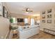 Open-concept living room with hardwood floors and contemporary decor flowing into dining area at 6328 Dusty Laurel Dr, Whitestown, IN 46075