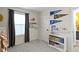 Neutral Bedroom featuring sports memorabilia, floating shelves, and light gray carpet at 6586 W Winding Bnd, McCordsville, IN 46055