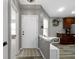 Clean foyer with neutral tones, leading to other areas of the home at 6586 W Winding Bnd, McCordsville, IN 46055