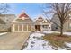 Charming home featuring a two-car garage, brick accents, and a quaint front porch at 6586 W Winding Bnd, McCordsville, IN 46055