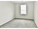 Neutral bedroom featuring plush carpeting and a window for natural light at 6591 Rushing, Noblesville, IN 46062