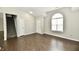Open-concept area with modern flooring, staircase, and bright natural light from the windows at 6591 Rushing, Noblesville, IN 46062
