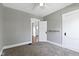 Neutral bedroom featuring a ceiling fan, carpet and trim at 67 S 9Th Ave, Beech Grove, IN 46107