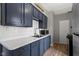Nicely appointed kitchen with attractive cabinets, countertop, and modern sink at 67 S 9Th Ave, Beech Grove, IN 46107