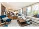 Welcoming living room with a comfortable sofa, stylish decor, and ample natural light at 7076 Portico Ln, McCordsville, IN 46055