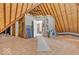 Unfinished attic featuring exposed wooden beams, ductwork, and construction materials at 7113 Lakeside Woods Dr, Indianapolis, IN 46278