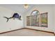 A bedroom with light carpet and natural light from the window at 7113 Lakeside Woods Dr, Indianapolis, IN 46278