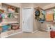 Well-organized storage room with shelving, a hanging rack, and plenty of space at 7113 Lakeside Woods Dr, Indianapolis, IN 46278