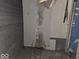 Damaged room needing repair, with water damage and peeling paint at 727 W 25Th St, Indianapolis, IN 46208