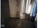 Damaged room needing repair, with water damage and peeling paint at 727 W 25Th St, Indianapolis, IN 46208
