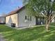 View of home's side exterior showcasing the well-kept lawn and tidy space at 760 E Walnut St, Martinsville, IN 46151