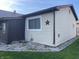 View of home's side exterior showcasing clean siding and tidy space at 760 E Walnut St, Martinsville, IN 46151