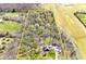 Aerial view of land showing home and surrounding property with a perimeter outlined in yellow showing lot lines at 8327 S County Road 825 E, Plainfield, IN 46168