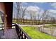 View of backyard, pond, and green space from a home deck at 8327 S County Road 825 E, Plainfield, IN 46168