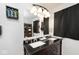 Modern bathroom with double sink vanity, updated mirror and dark curtains at 8327 S County Road 825 E, Plainfield, IN 46168