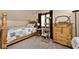 Cozy bedroom with a gray and white color scheme and wooden furniture at 8327 S County Road 825 E, Plainfield, IN 46168