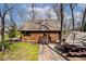 Charming home with natural landscaping, brick pathway, and patio at 8327 S County Road 825 E, Plainfield, IN 46168