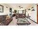 Inviting living room featuring neutral carpet, ceiling fan, and comfortable furnishings, creating a cozy atmosphere at 8327 S County Road 825 E, Plainfield, IN 46168