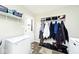 Mud room with a freezer, storage for coats and shoes, and an exterior door at 8327 S County Road 825 E, Plainfield, IN 46168