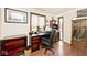 Office room with built-in shelving, desk, and a large window letting in ample light at 8327 S County Road 825 E, Plainfield, IN 46168