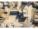 Aerial view of the property showcasing the building, parking area and surrounding neighborhood at 840 Cottage Ave, Indianapolis, IN 46203