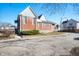 Brick building with a white top on a sunny day at 840 Cottage Ave, Indianapolis, IN 46203