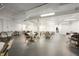 Spacious hall featuring tables with white cloths and chairs, ready for an event or gathering at 840 Cottage Ave, Indianapolis, IN 46203