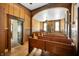 Interior shot of room with wooden pews and doors at 840 Cottage Ave, Indianapolis, IN 46203