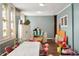 Bright room with toys, cabinet, stained glass windows, and a playful, inviting atmosphere at 840 Cottage Ave, Indianapolis, IN 46203