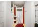 Simple standing shower with a curtain, convenient shelf, and a compact layout at 840 Cottage Ave, Indianapolis, IN 46203