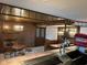 Wet bar area showing soda fountain, dark wood finishes, classic booth seating, and brick fireplace visible in background at 8801 Ridge Hill Dr, Indianapolis, IN 46217