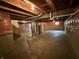 Spacious unfinished basement with exposed ductwork and insulation, offering ample storage or customization options at 8859 Delaney Dr, Fishers, IN 46038