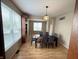 Bright dining room with large windows and ample seating for Gathering and guests at 8859 Delaney Dr, Fishers, IN 46038