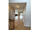 Inviting entryway with hardwood floors leading to a bright and open living area at 8859 Delaney Dr, Fishers, IN 46038