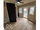 Bright bedroom with new flooring, windows and ceiling fan at 9218 Wind River Ct, Indianapolis, IN 46234