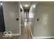 Hallway view showcasing the home's layout and neutral color palette at 9218 Wind River Ct, Indianapolis, IN 46234