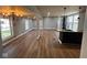 Open-concept living space featuring new floors and fresh gray paint at 9218 Wind River Ct, Indianapolis, IN 46234