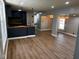 Open-concept living space featuring new floors and fresh gray paint at 9218 Wind River Ct, Indianapolis, IN 46234