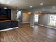 Open-concept living space featuring new floors and fresh gray paint at 9218 Wind River Ct, Indianapolis, IN 46234