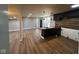 Open-concept living space featuring new floors and fresh gray paint at 9218 Wind River Ct, Indianapolis, IN 46234