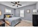Serene bedroom with soft carpet, natural light, and a neutral color palette at 936 N Oxford St, Indianapolis, IN 46201