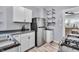 Modern kitchen featuring stainless steel appliances, white cabinets, and stylish countertops at 936 N Oxford St, Indianapolis, IN 46201