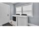 Laundry room with a set of appliances and a view to the yard at 936 N Oxford St, Indianapolis, IN 46201