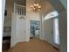 Spacious foyer with staircase and view into the living space at 10404 Trillium Ct, Noblesville, IN 46060